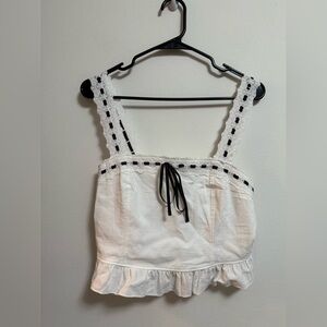 Chic White‎ Sleeveless Blouse with Black Accents